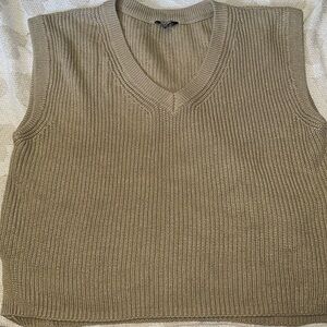 Tan coloured sweater vest